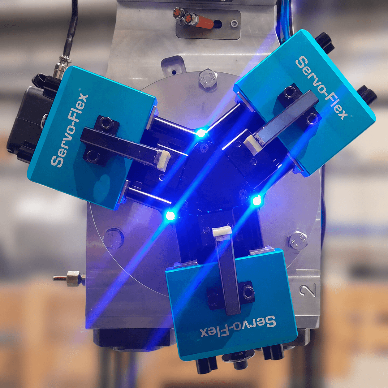 Servo-Flex Flexi 150 three-jaw servo-electric industrial robot gripper with blue safety LEDs